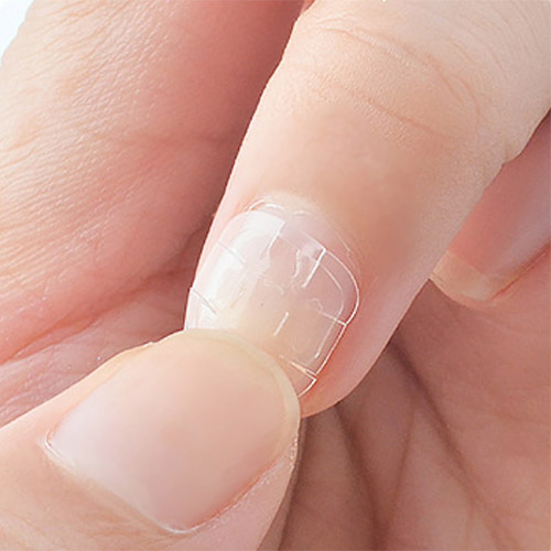 How to apply adhesive nail tape for press-on nails - step 4