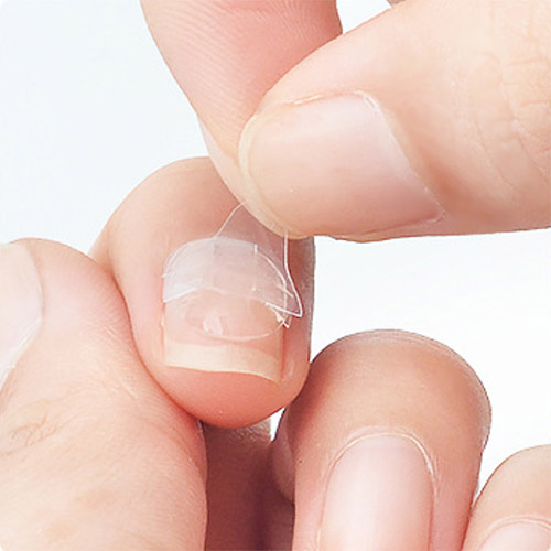 How to apply adhesive nail tape for press-on nails - step 5